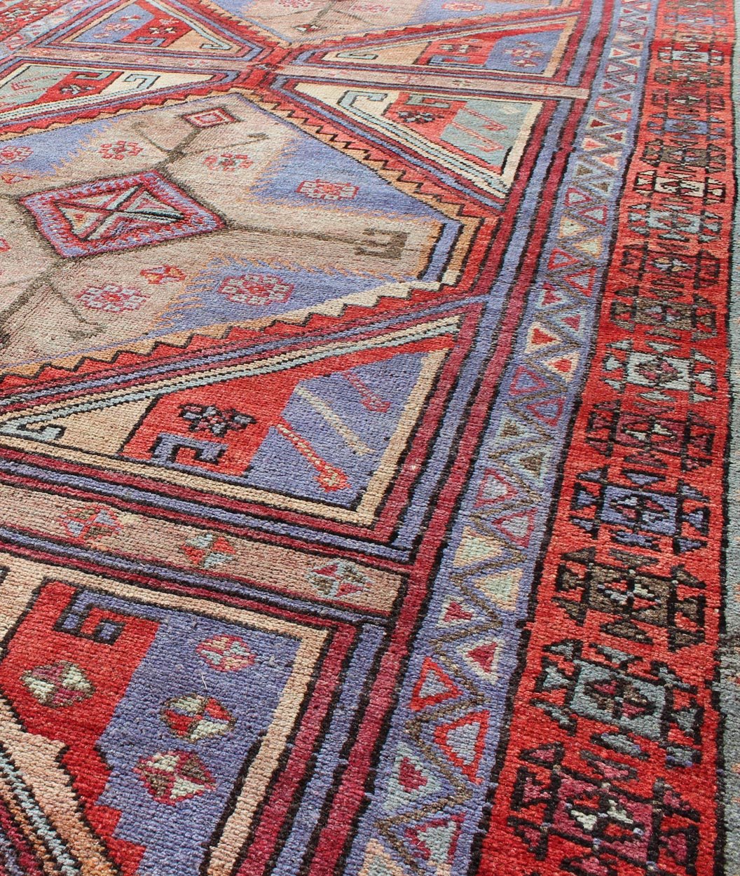 Vivid and Colorful Oushak Runner with Repeating Diamond Medallions rug - tu - ugu - 136008 origin/turkey This Turkish Oushak runner features a repeating medallion design. Colors include bright and soft red, mint green, taupe, and light purple. Turkish... - Keivan Woven ArtsTU - UGU - 136008 - 4668Rug
