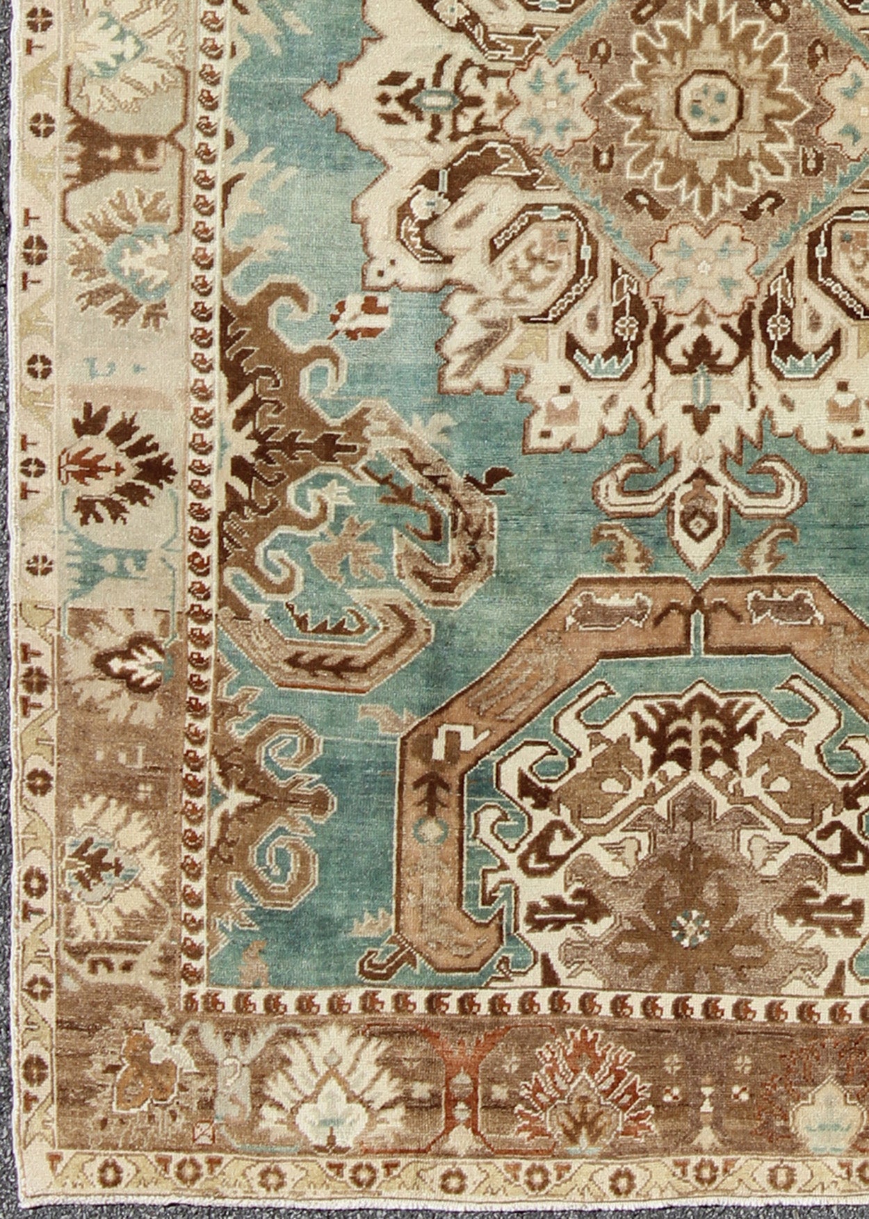 Vintage Hand Knotted Turkish Carpet With Geometric Tribal Medallion Design Geometric design rug in brown, turquoise, taupe, and ivory, Keivan Woven Arts / rug tu - ugu - 3402, country of origin / type: Turkey / Oushak, circa 1940 Set on a uni... - Keivan Woven ArtsTU - UGU - 3402 - 5906Rug