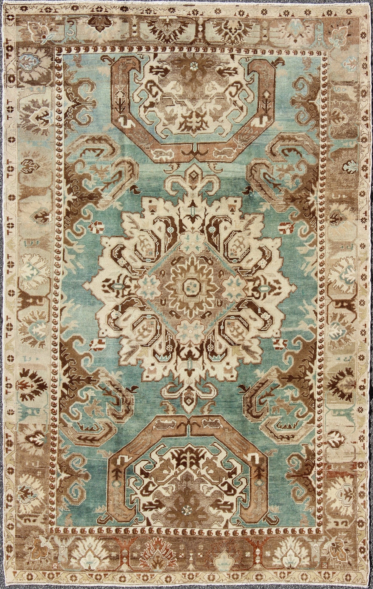 Vintage Hand Knotted Turkish Carpet With Geometric Tribal Medallion Design Geometric design rug in brown, turquoise, taupe, and ivory, Keivan Woven Arts / rug tu - ugu - 3402, country of origin / type: Turkey / Oushak, circa 1940 Set on a uni... - Keivan Woven ArtsTU - UGU - 3402 - 5906Rug