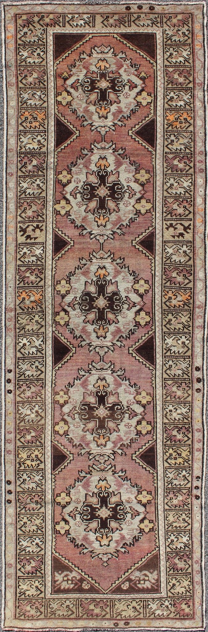 Vintage Turkish Oushak Runner with Floral Medallions in Brown Lavender and Taupe Measures: 2'11'' x 9'8''. This beautiful vintage Oushak runner from 1940s Turkey features a Classic Oushak design. The reddish - colored ground is home to intercon... - Keivan Woven ArtsTU - UGU - 3482 - 6933Rug