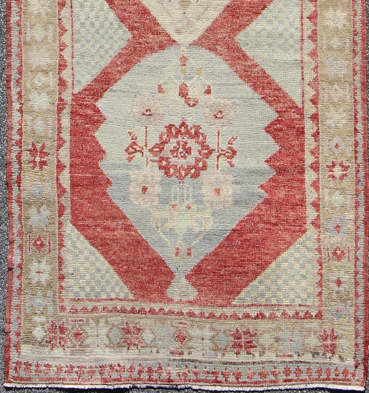 Vintage Turkish Oushak Medallion Runner in Soft Red, Lt. Blue, Cream Measures: 3'8'' x 9'7'' This beautiful vintage Oushak runner from 1930s Turkey features a Classic Oushak design, which is enhanced by its lustrous wool. The rich red gro... - Keivan Woven ArtsTU - UGU - 3601 - 6937Rug