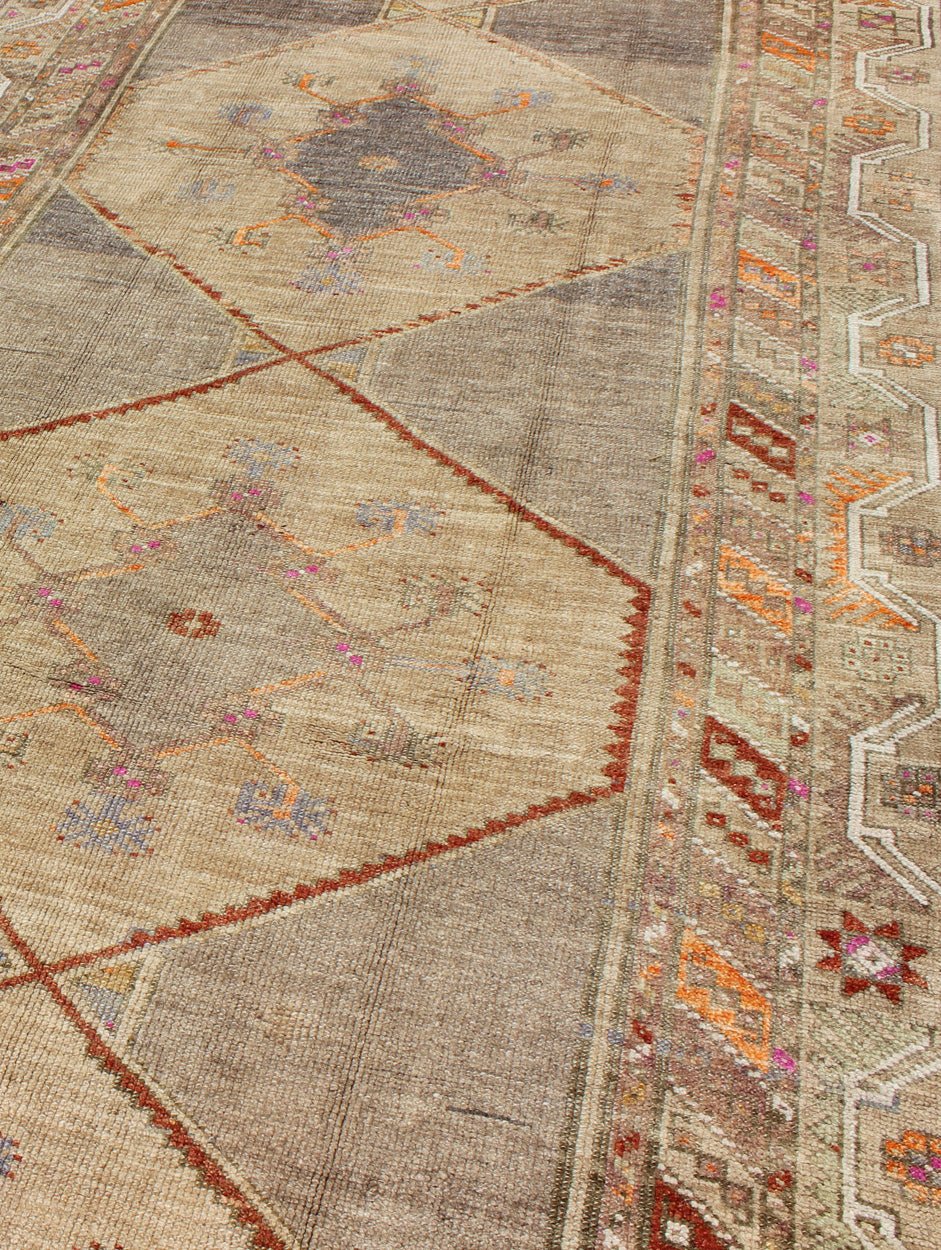 Colorful Turkish Gallery Runner with Multi - Medallion Design & Unique Colors. Vintage Oushak Rug from Turkey with Tribal Geometric Design, rug TU - UGU - 4807, country of origin / type: Turkey / Oushak, circa 1930 This Turkish carpet from 2n... - Keivan Woven ArtsTU - UGU - 4807 - 10293Rug