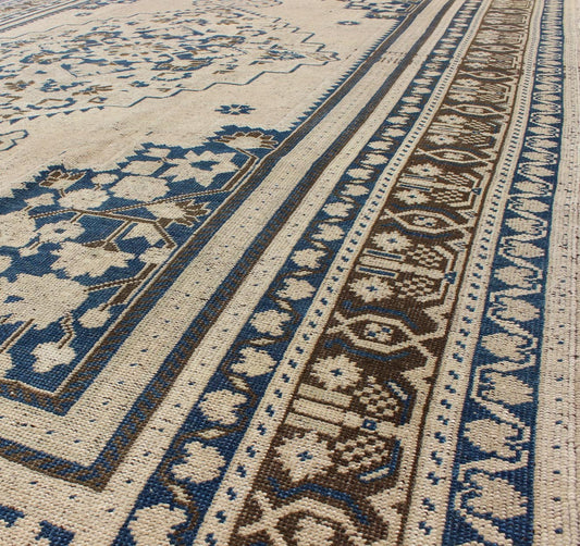 Vintage Turkish Oushak Rug with Medium Blue, Brown and Cream Colors. Vintage Turkish Oushak rug, Rug TU - UGU - 54, country of origin / type: Turkey / Oushak, circa mid - 20th century. This exquisite vintage Turkish Oushak features a star medal... - Keivan Woven ArtsTU - UGU - 54 - 2848