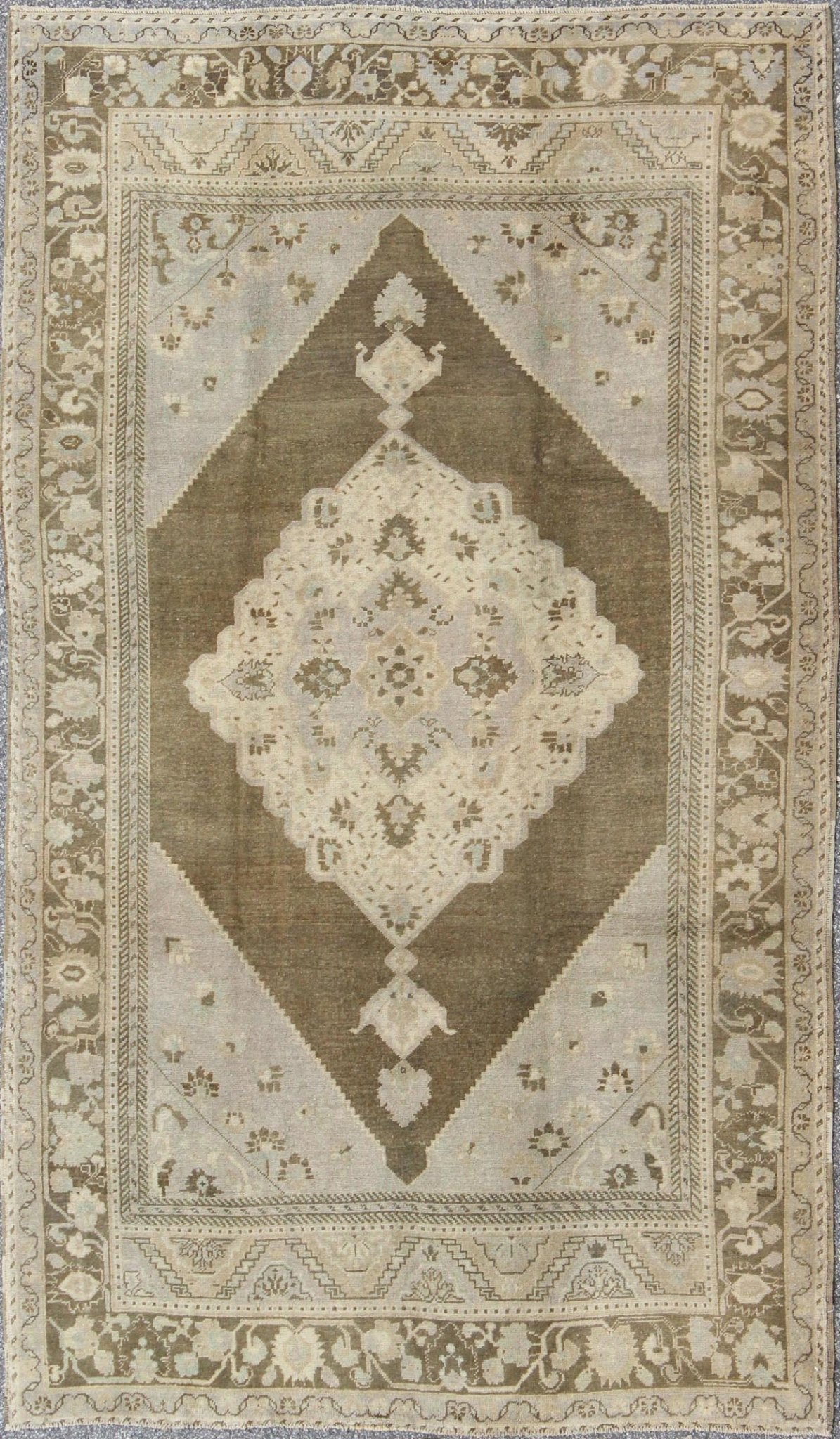 Nude, taupe, and brown medallion design Turkish vintage Oushak rug, rug tu - vey - 3281, country of origin / type: Turkey / Oushak, circa 1940. This striking vintage Turkish Oushak rug bears a brown - colored body that is highlighted by a dazzling med... - Keivan Woven ArtsTU - VEY - 3281 - 6241Rug