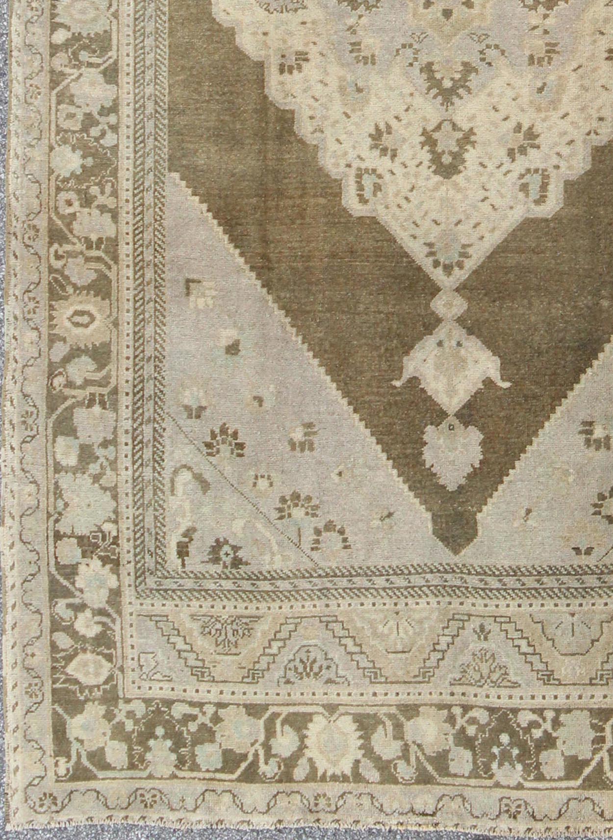 Nude, taupe, and brown medallion design Turkish vintage Oushak rug, rug tu - vey - 3281, country of origin / type: Turkey / Oushak, circa 1940. This striking vintage Turkish Oushak rug bears a brown - colored body that is highlighted by a dazzling med... - Keivan Woven ArtsTU - VEY - 3281 - 6241Rug