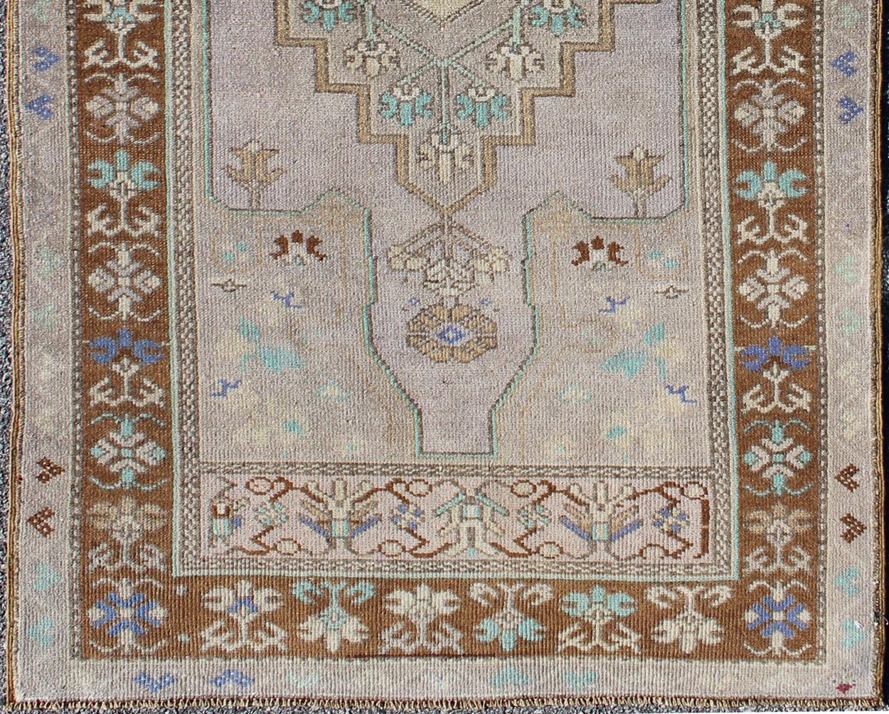 Vintage Oushak Rug in Light Lavender Background and Chocolate Brown Border. Vintage Oushak rug with central medallion in Light lavender, Taupe, Khaki, Teal green, blue accent colors and chocolate brown border. Keivan Woven Arts Rug TU - VEY - 3287,... - Keivan Woven ArtsTU - VEY - 3287 - 5910Rug