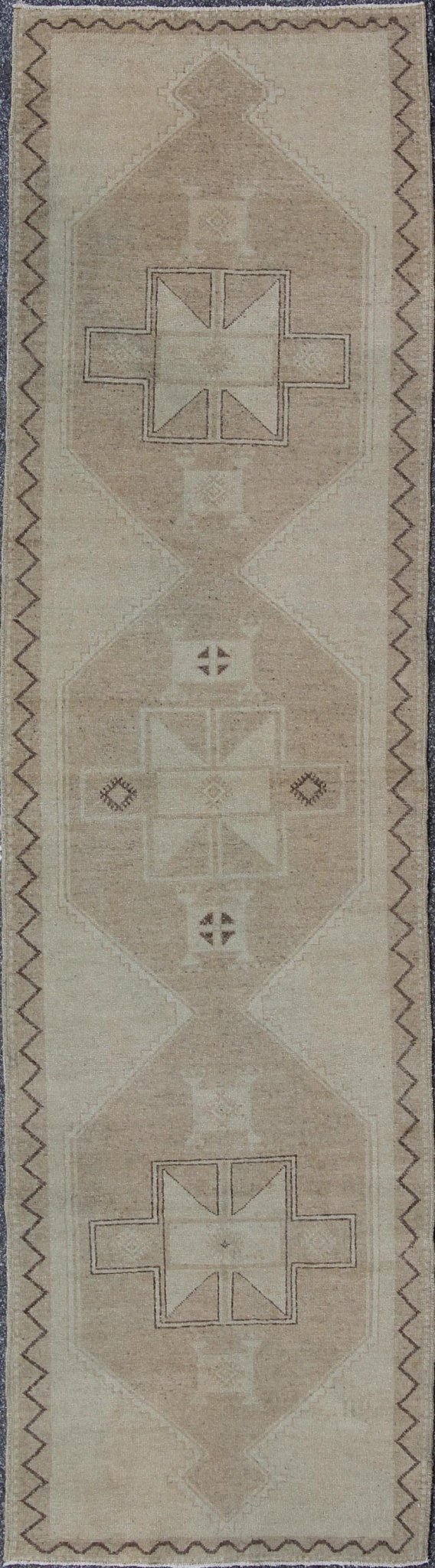 Neutral Oushak Runner This Oushak runner presents three unique medallions laid out across a solid beige field. Each medallion contains a variation of beige, tan, cream, and brown, which blend together to accentuate its delicate geometrical desig... - Keivan Woven ArtsTU - VEY - 3288 - 5916Rug