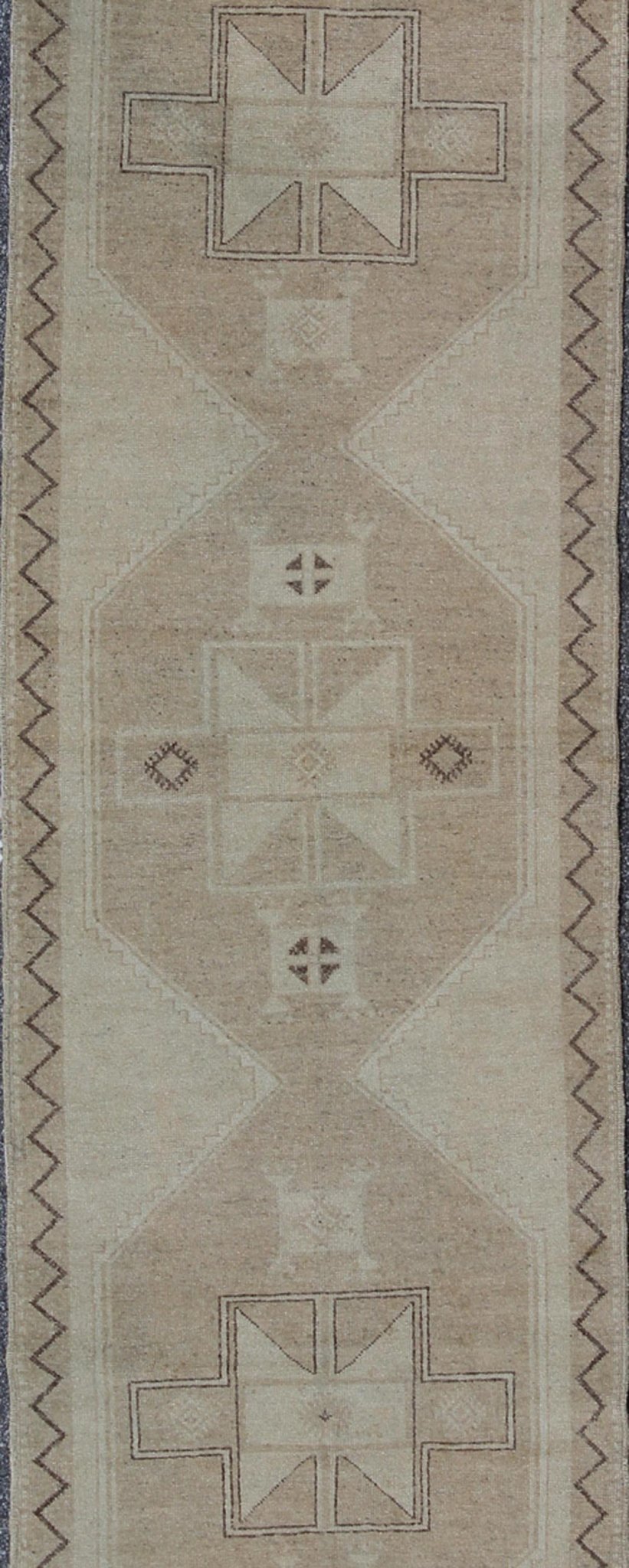 Neutral Oushak Runner This Oushak runner presents three unique medallions laid out across a solid beige field. Each medallion contains a variation of beige, tan, cream, and brown, which blend together to accentuate its delicate geometrical desig... - Keivan Woven ArtsTU - VEY - 3288 - 5916Rug