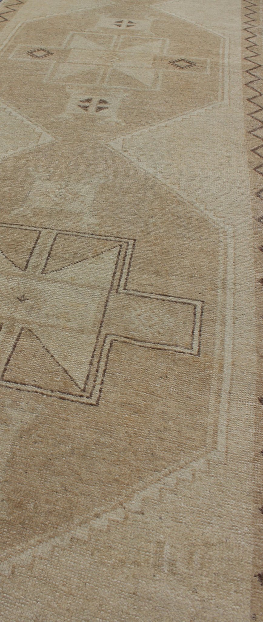 Neutral Oushak Runner This Oushak runner presents three unique medallions laid out across a solid beige field. Each medallion contains a variation of beige, tan, cream, and brown, which blend together to accentuate its delicate geometrical desig... - Keivan Woven ArtsTU - VEY - 3288 - 5916Rug