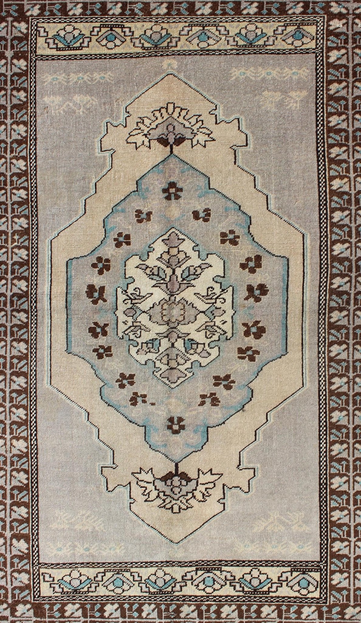 Vintage Turkish Medallion Oushak Area Rug in Gray, Taupe, Brown and Cream Measures: 3'11 x 5'6 This piece was hand - knotted in the mid - century in Turkey. The field displays a diamond medallion decorated with floral motifs. The field is r... - Keivan Woven ArtsTU - VEY - 3289 - 6251Rug