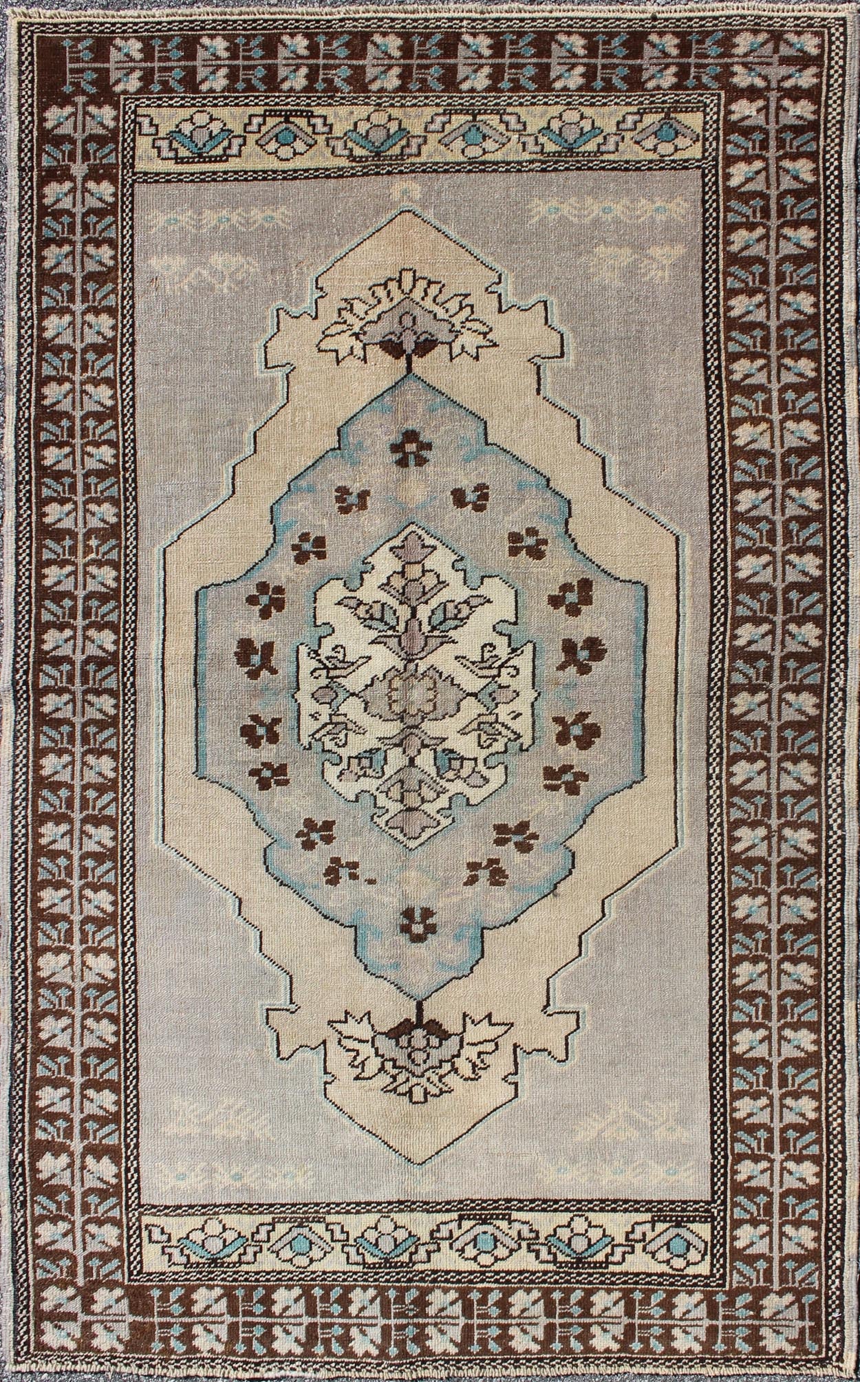 Vintage Turkish Medallion Oushak Area Rug in Gray, Taupe, Brown and Cream Measures: 3'11 x 5'6 This piece was hand - knotted in the mid - century in Turkey. The field displays a diamond medallion decorated with floral motifs. The field is r... - Keivan Woven ArtsTU - VEY - 3289 - 6251Rug