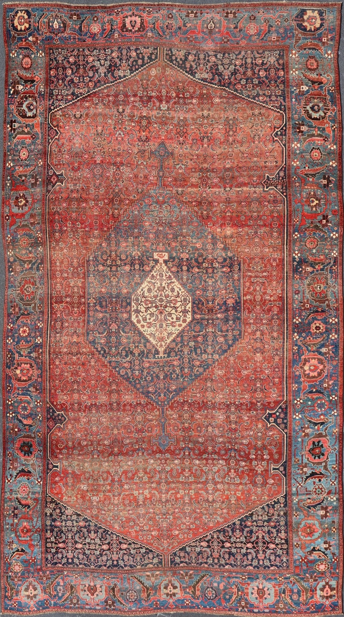 Very Large Antique Persian Bidjar Rug in Multi Shades of Blue, Tera - cotta & Red. Classic Bidjar in Tera - cotta and variety of beautiful red tones, framed by variegated shades of blue colors in the border with large Scale Geometrics. Bidjar antique r... - Keivan Woven ArtsV21 - 0106 - 14536