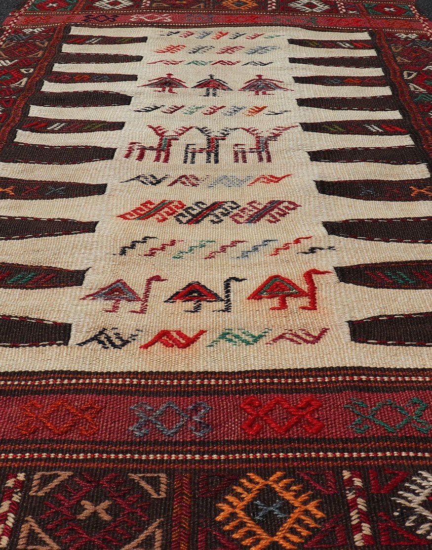 Vintage Tribal Baluch Rug With Pile and Kilim in Ivory Background Vintage Baluch Tribal rug in Shades of brown, tan, cream and red, This rug has a pair which is also listed on this website,V21 - 0810 Rug V21 - 0809, country of origin / type: Ir... - Keivan Woven ArtsV21 - 0809 - 16997Rug