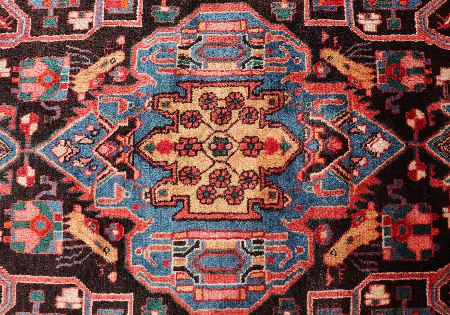 Antique Persian Nahavand Rug with All - Over Sub - Geometric Tribal Design Measures: 4'3 x 9'4. This absolutely stunning Antique Nahavand (circa 1920s) features a symmetrical sub - geometric design rendered in shades of reds, blues, greens, cre... - Keivan Woven ArtsV21 - 1103 - 18341