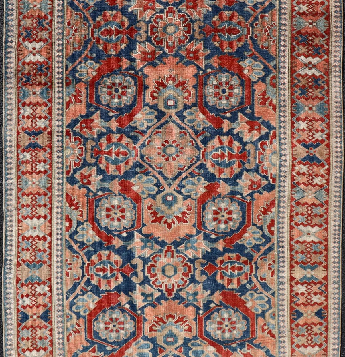 Antique Persian Tabriz Gallery Rug with Large Scale Sub Geometric Florals Antique Persian Tabriz Gallery Rug with Large Scale Sub Geometric Florals in Medium Blue Field, red, salmon ,light blue and cream. Keivan Woven Arts / rug VAS - 50331, coun... - Keivan Woven ArtsVAS - 50331 - 22387Rug