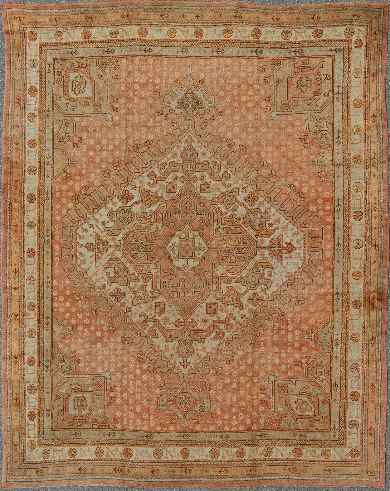 Antique Turkish Oushak Rug with Geometric Medallion by Keivan Woven Arts Antique Turkish Oushak rug with geometric medallion in Salmon background. Keivan Woven Arts / VR - 7884 / country of origin / type: Turkey / Oushak, circa Early - 20th century.... - Keivan Woven ArtsVR - 7884 - 1931Rug