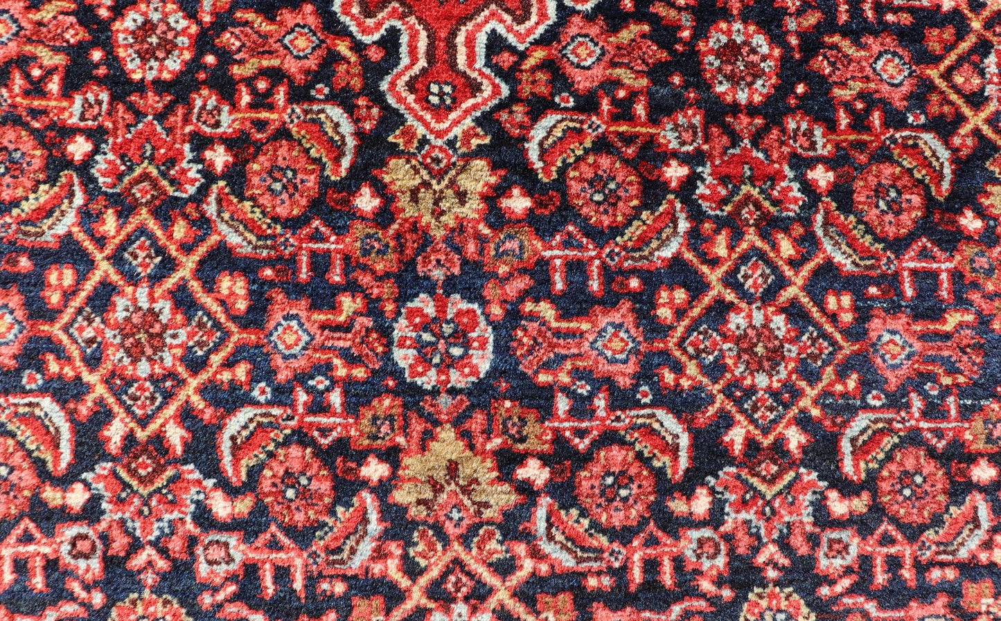 Antique Persian Bidjar Medallion Designed Carpet with of Blue's, Red, and Pink Measures: 4'5 x 6'7 The rug has a central medallion, surrounded by an intricate floral Herati design. The border utilizes softer colors of pink, blue and yel... - Keivan Woven ArtsW22 - 0102 - 18577