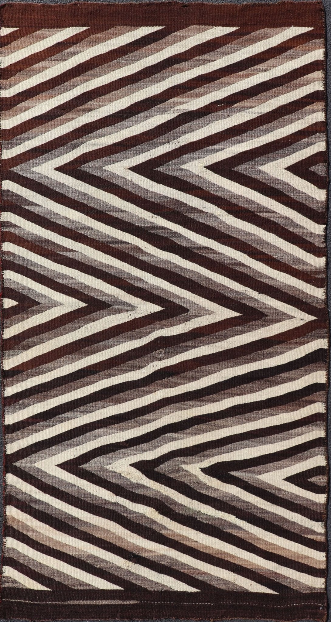 Large Early Navajo Tribal Rug with Large Zig - Zag Design in Brown, Ivory Native American Navajo Tribal Rug with Large Zig - Zag Design. Keivan Woven Arts / rug W22 - 0902, country of origin / type: America / Navajo, circa early - 20th Century. ... - Keivan Woven ArtsW22 - 0902 - 21373