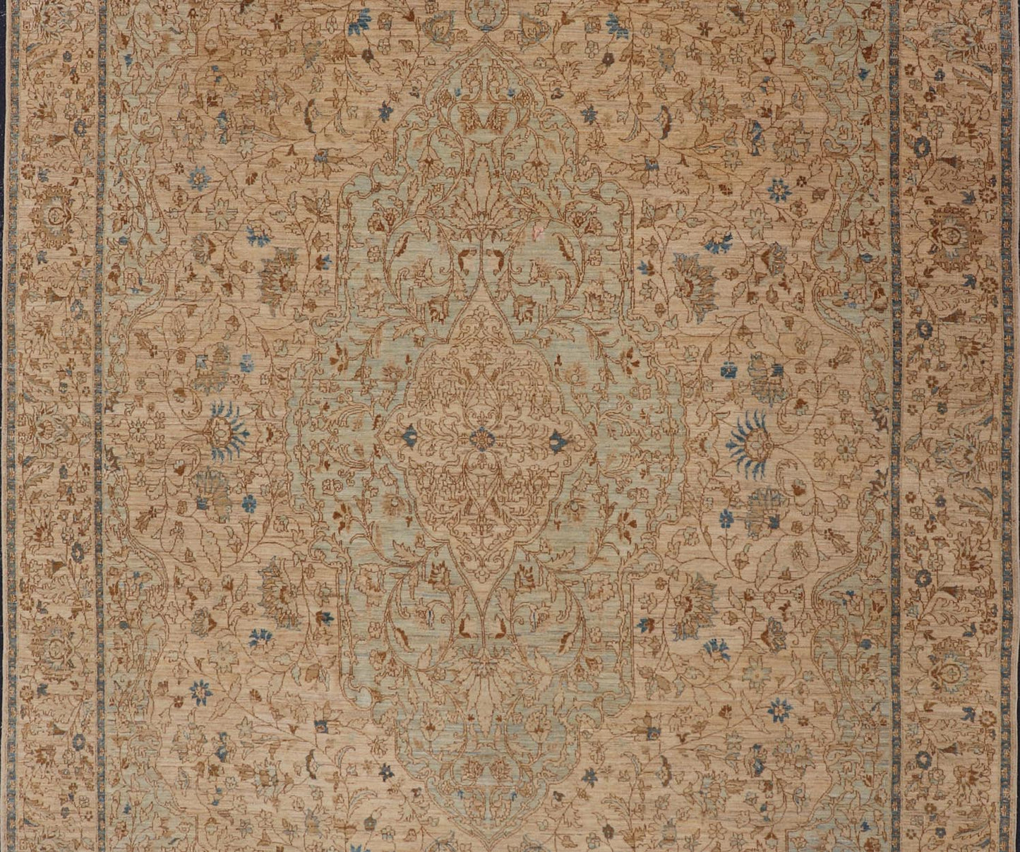 This very finely woven transitional rug, made in Turkey, is inspired by Haj Jalili Tabriz of 19th century. The light colors include cream color field and light blue highlights. Circa 1980's 9'5 x 13'5 - Keivan Woven ArtsWL - 214815 - 1193Rug
