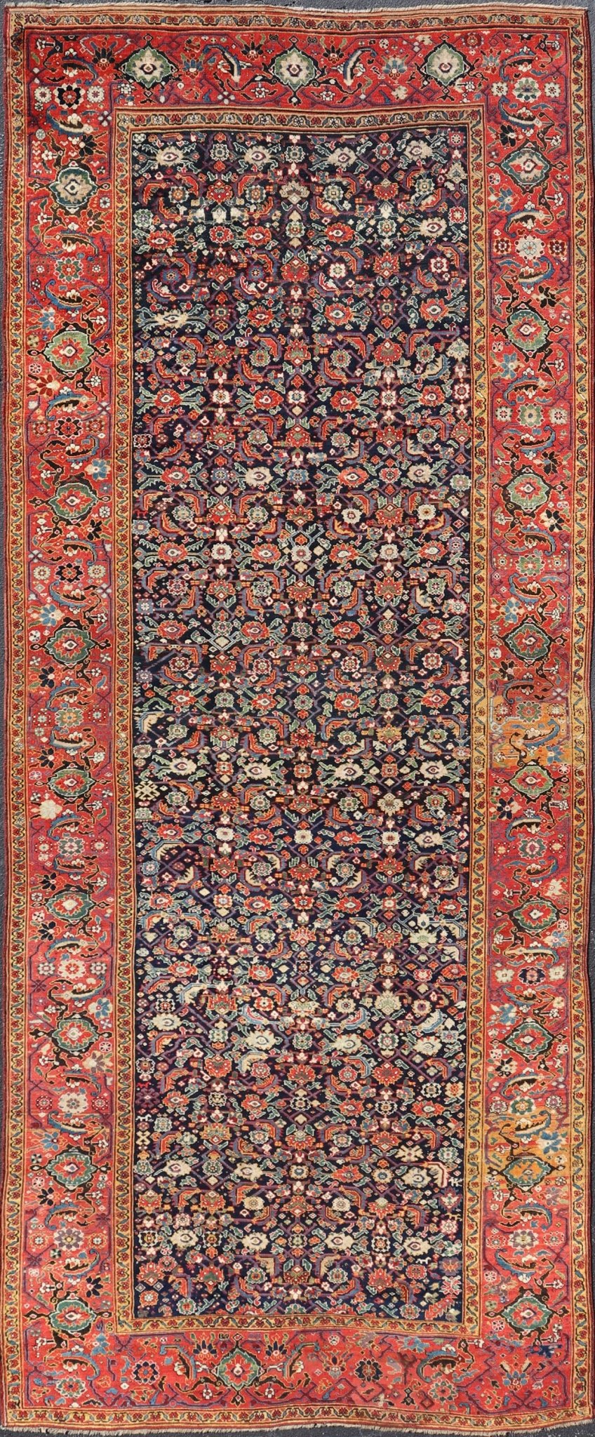 1870's Antique N.W. Persian Large Gallery Rug in Blue Background, Red Border From the estate of Jack Welch, the American Executive, this circa 1875 antique N.W. long gallery runner displays rich and brilliant array of colors set on blue backgro... - Keivan Woven ArtsX23 - 0204 - 23468