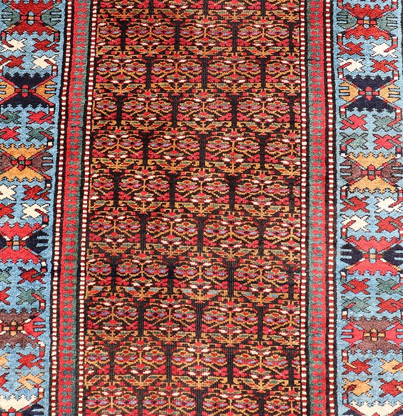 Antique Persian Kurdish Long Gallery Runner with Repeating Tribal Motif Design. Keivan Woven Arts; rug X23 - 0816 - 335; country of origin / type: Persian / Kurdish circa 1900. Measures: 3'5 x 14'9 This antique hand - knotted Persian Kurdish wide runn... - Keivan Woven ArtsX23 - 0816 - 335 - 24862Rug