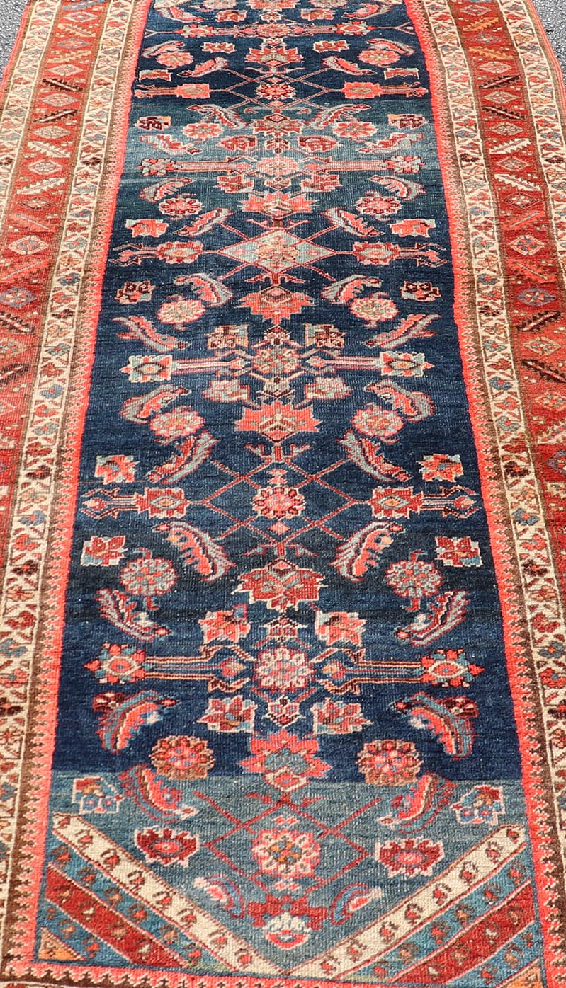 Antique Persian Bidjar Runner with Small Floral Motifs in Blue, Red, and Ivory. Keivan Woven Arts / rug /X23 - 0819 - 399, country of origin / type: Iran / Bidjar, circa 1900 Measures: 3'6 x 10'0 This antique Persian Bidjar wide runner features a be... - Keivan Woven ArtsX23 - 0819 - 399 - 24880Rug