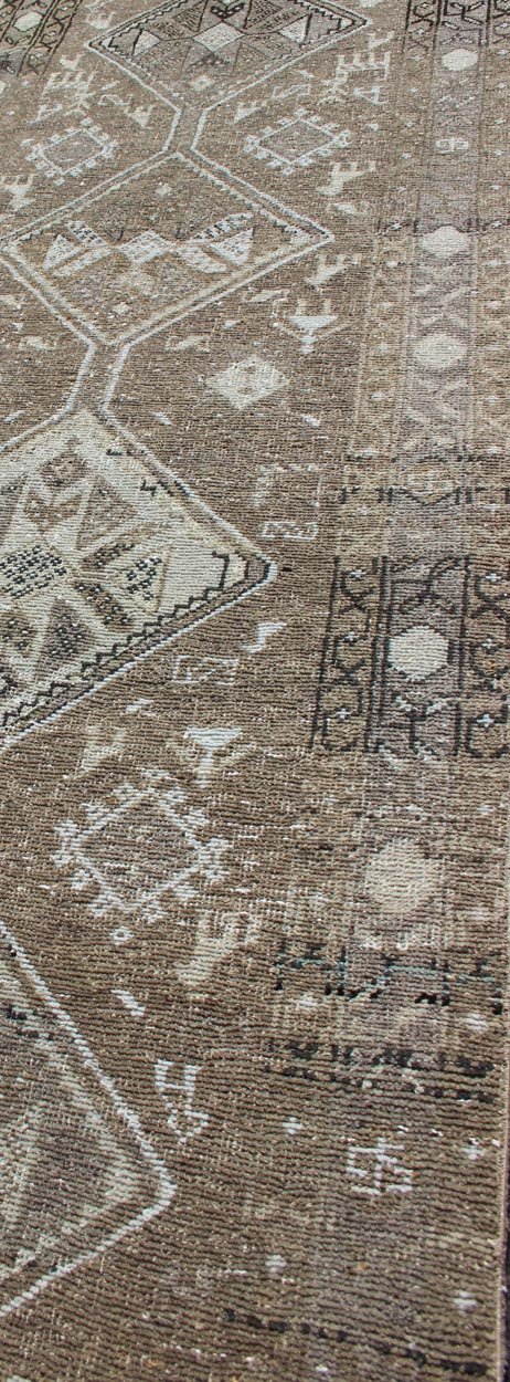 Tribal diamond medallion antique Heriz runner Persian in taupe, camel, brown, rug zir - 20, country of origin / type: Iran / Heriz, circa 1910 This antique Persian Heriz gallery rug, circa early 20th century, features a unique blend of colors and ... - Keivan Woven ArtsZIR - 20 - 10090Rug