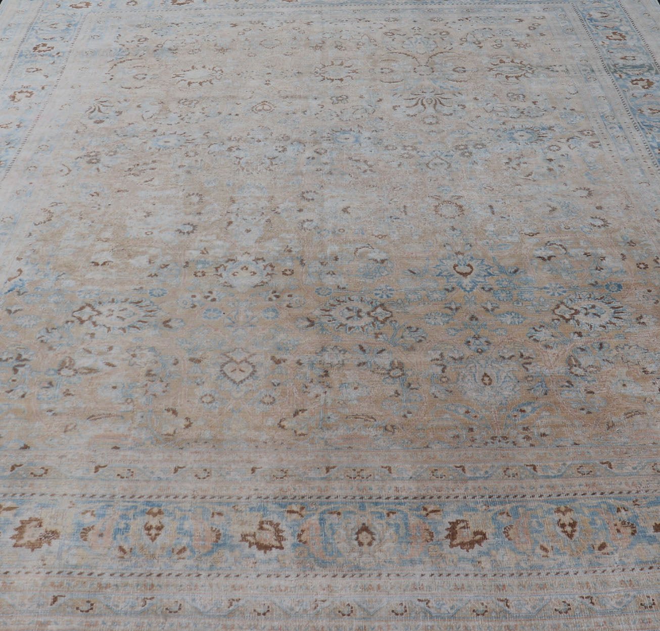 Persian distressed Antique Mashhad Carpet with Muted Floral and Medallion Design. Antique distressed Persian Mashhad carpet with tan and blue floral and medallion design, / ZIR - 51 - KV - 10. Persian Mashhad floral design. This outstanding mu... - Keivan Woven ArtsZIR - 51 - KV - 10 - 14994