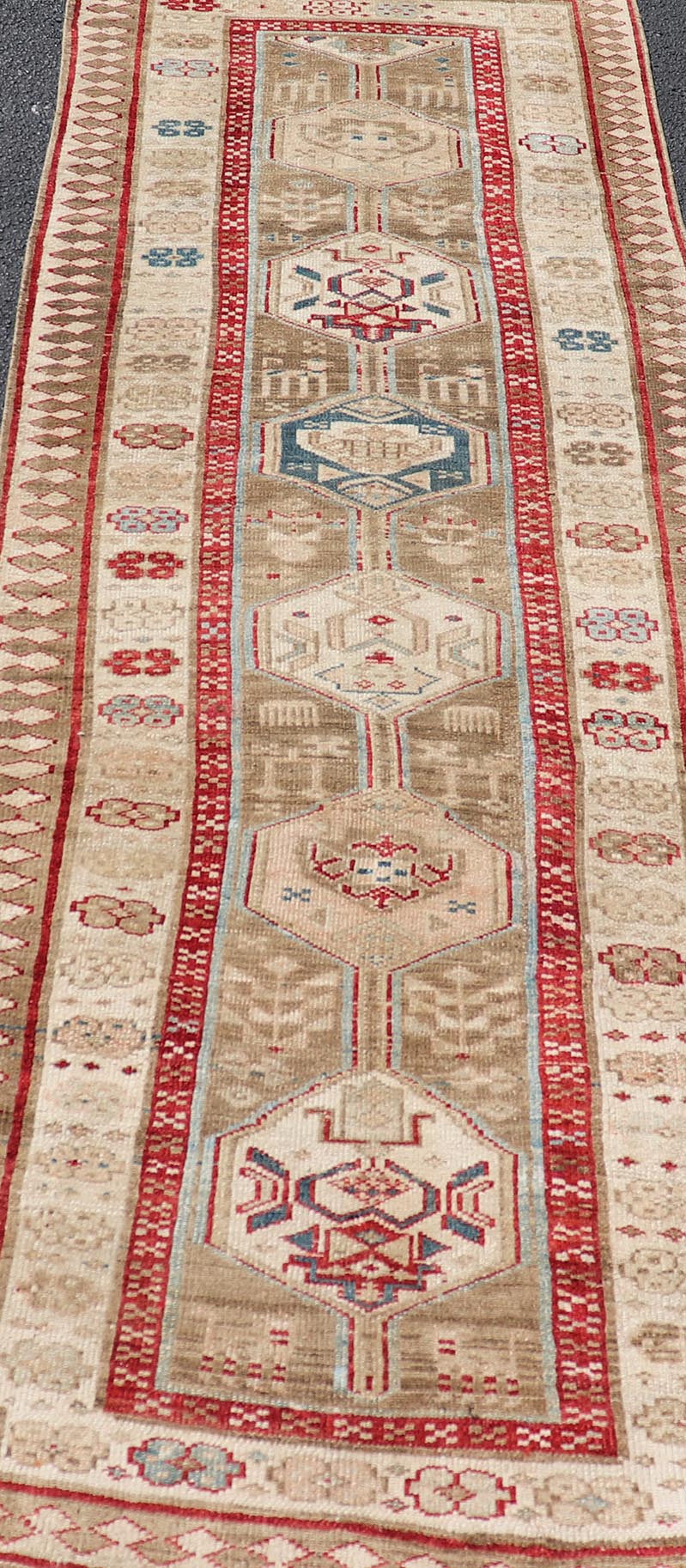 Persian Hand Knotted Antique Serab Runner in Tribal Design With Medallions. Antique Persian Tribal Serab runner, Keivan Woven Arts / rug/ ZIR - 59 - KV - 05, origin/iran 1900 Measures: 3'0 x 8'10 This antique Serab carpet from 1900s Persia features a ... - Keivan Woven ArtsZIR - 59 - KV - 05 - 15018