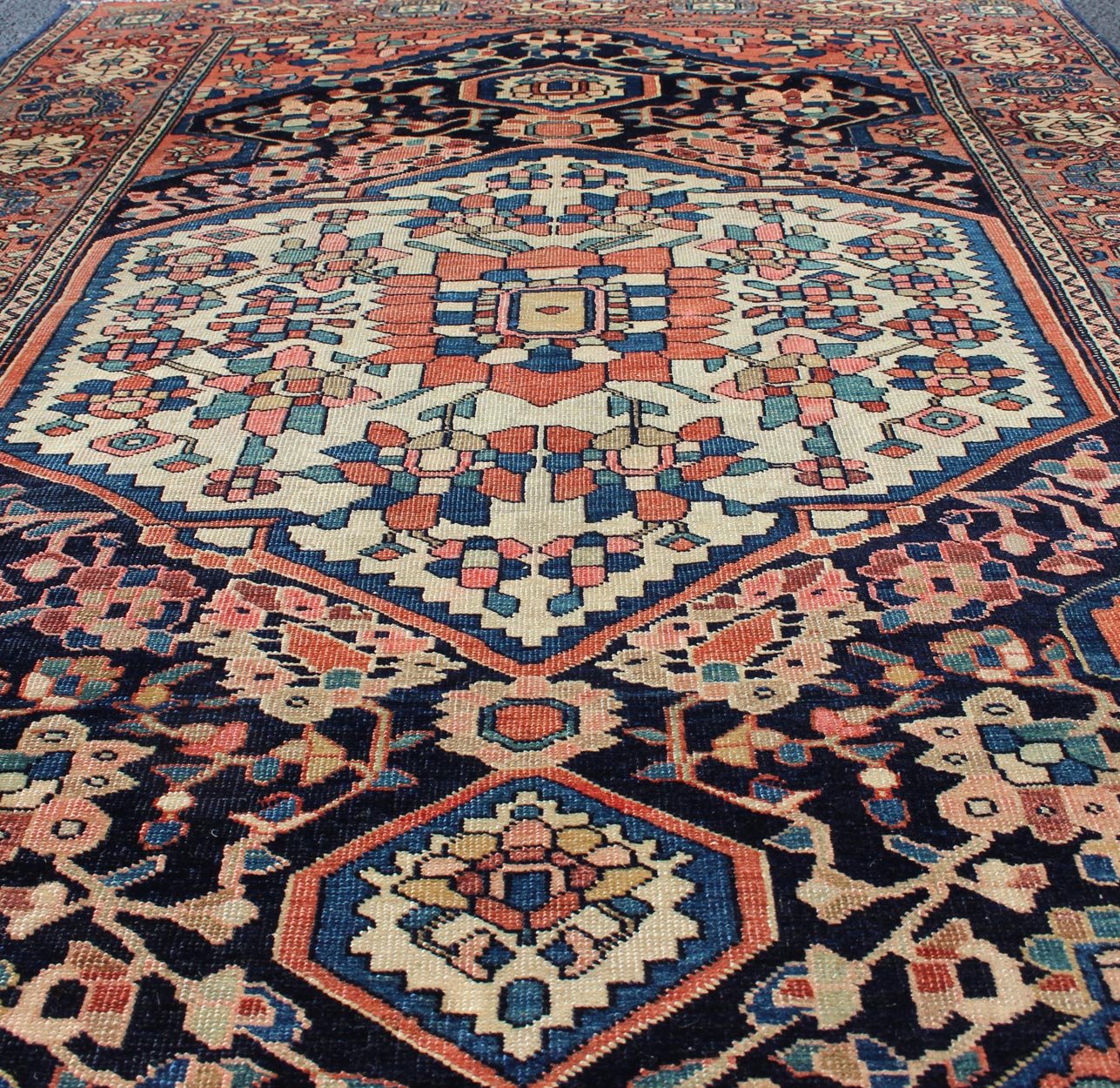 Antique Sarouk Farahan Rug with Branching Floral, Sub - Geometric Motifs This exquisite antique Farahan carpet bears an oversized central medallion and branching floral motifs. Alternating sub - geometric motifs compose the surrounding border. The p... - Keivan Woven Arts10 - 81112 - 1072Rug