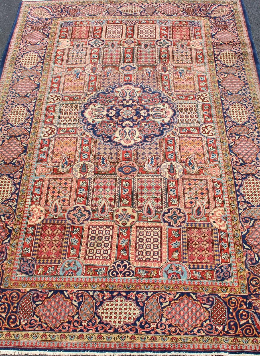 Antique Kashan Rug This finely woven area - size kurk dabir Kashan antique Persian rug creates a sense of great harmony and inspiration through its use of an elaborate vase design overflowing with finely detailed flowers. The piece boasts a joyous... - Keivan Woven Arts10 - KE - 306 - 227Rugs