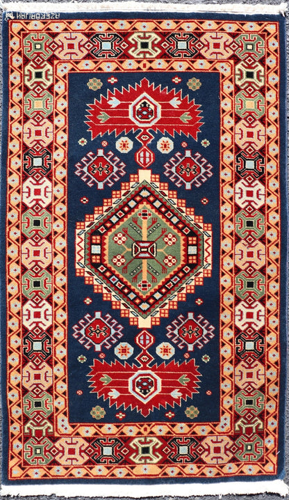 Tribal geometric medallion design vintage rug from Caucasus in multi - colors, Keivan Woven Arts / rug 10 - KE - 311, country of origin / type: Caucasus / Tribal, late 20th century Measures: 2'0 x 4'0 The vibrant reds, blues, and ivories that decorate ... - Keivan Woven Arts10 - KE - 311 - 1259Rug