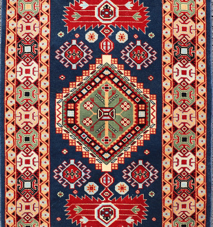 Tribal geometric medallion design vintage rug from Caucasus in multi - colors, Keivan Woven Arts / rug 10 - KE - 311, country of origin / type: Caucasus / Tribal, late 20th century Measures: 2'0 x 4'0 The vibrant reds, blues, and ivories that decorate ... - Keivan Woven Arts10 - KE - 311 - 1259Rug