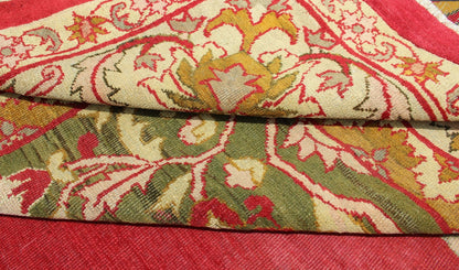 Indian Agra Antique Rug with Center Medallion in Green, Red, and Gold Colors. Keivan Woven Arts / 11 - 90208, circa 1910, Early 20 - th Century Indian Agra This outstanding Agra rug from the late 19th Century, with its bold design and color comb... - Keivan Woven Arts11 - 90208 - 151Rug