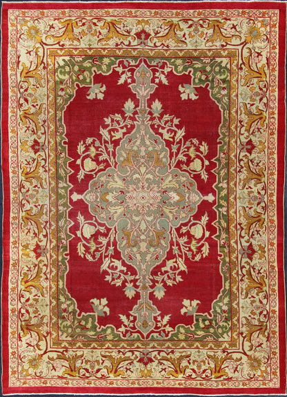 Indian Agra Antique Rug with Center Medallion in Green, Red, and Gold Colors. Keivan Woven Arts / 11 - 90208, circa 1910, Early 20 - th Century Indian Agra This outstanding Agra rug from the late 19th Century, with its bold design and color comb... - Keivan Woven Arts11 - 90208 - 151Rug