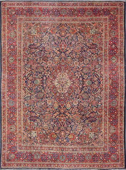 Fine Kashan Red and blue antique Persian Manchester Kashan rug with Arabesque blossom design, rug 11 - 90401, country of origin / type: Iran / Kashan, circa 1910 Gorgeous antique rug (circa 1910). Madder red and indigo blue set the attractive col... - Keivan Woven Arts11 - 90401 - 207Rug