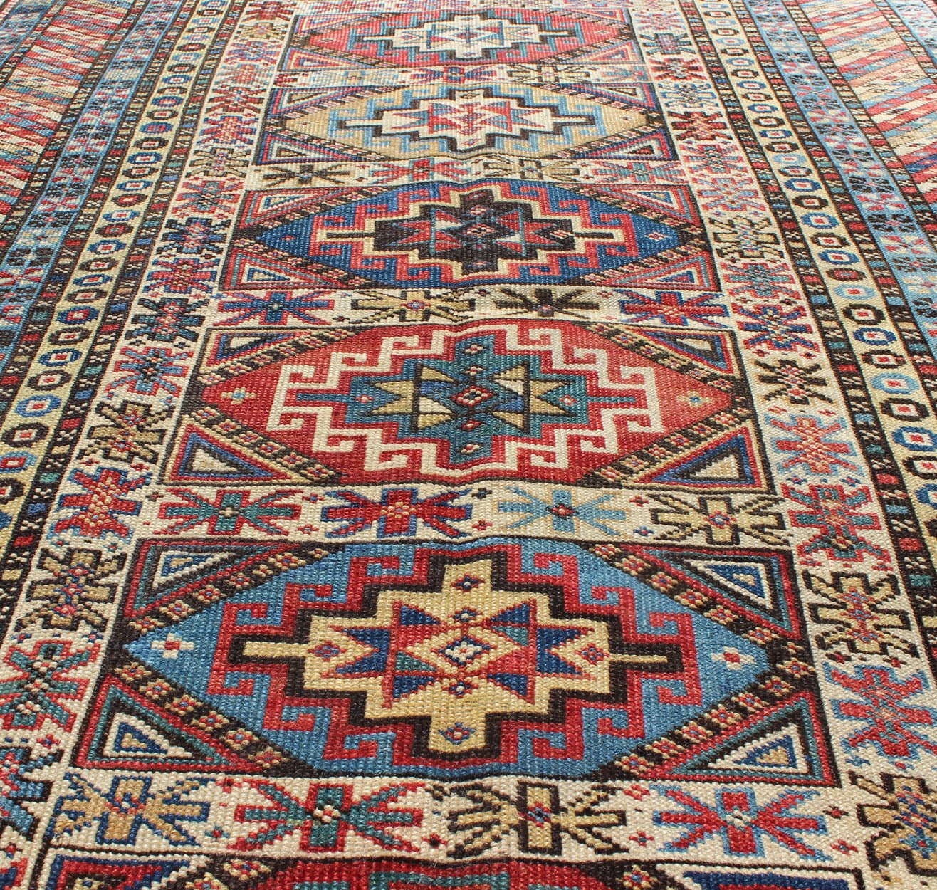 Antique Caucasian Rug with Six Central Medallions & Intricate Geometric Borders. Keivan Woven Arts / rug 13 - 0302, country of origin / type: Caucus / Kuba, circa 1880. Measures: 3'4 x 5'0. This stunning late 19th century Kuba rug from the Caucasus... - Keivan Woven Arts13 - 0302 - 4042Rug