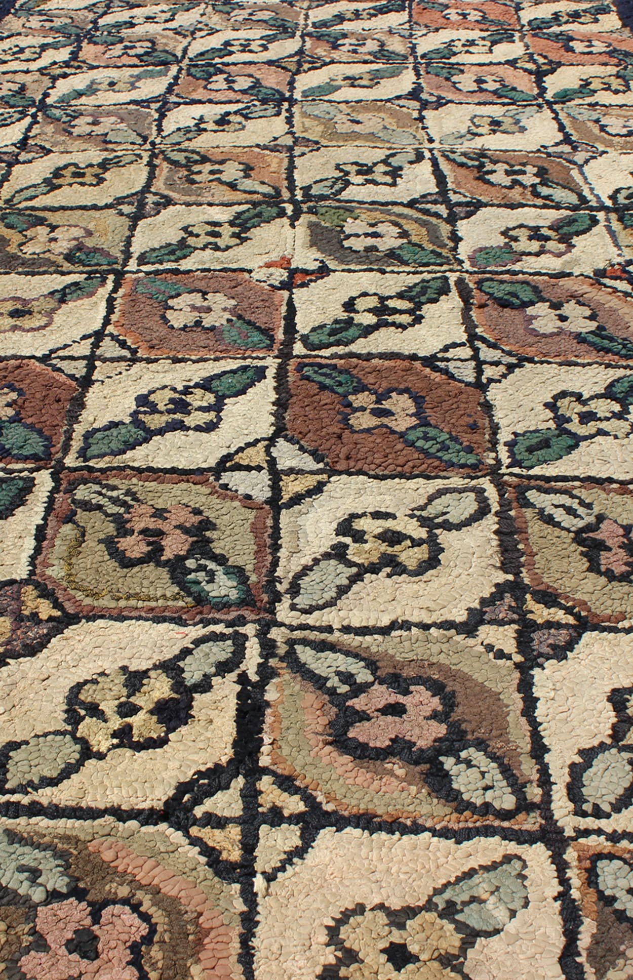 Antique American Hooked rug with all over geometric leaf design, rug 13 - 0304, country of origin / type: United States / Hooked, circa 1920 Ingenious in style, color and composition, the features in this spectacular, antique American Hooked rug c... - Keivan Woven Arts13 - 0304 - 4048Rug