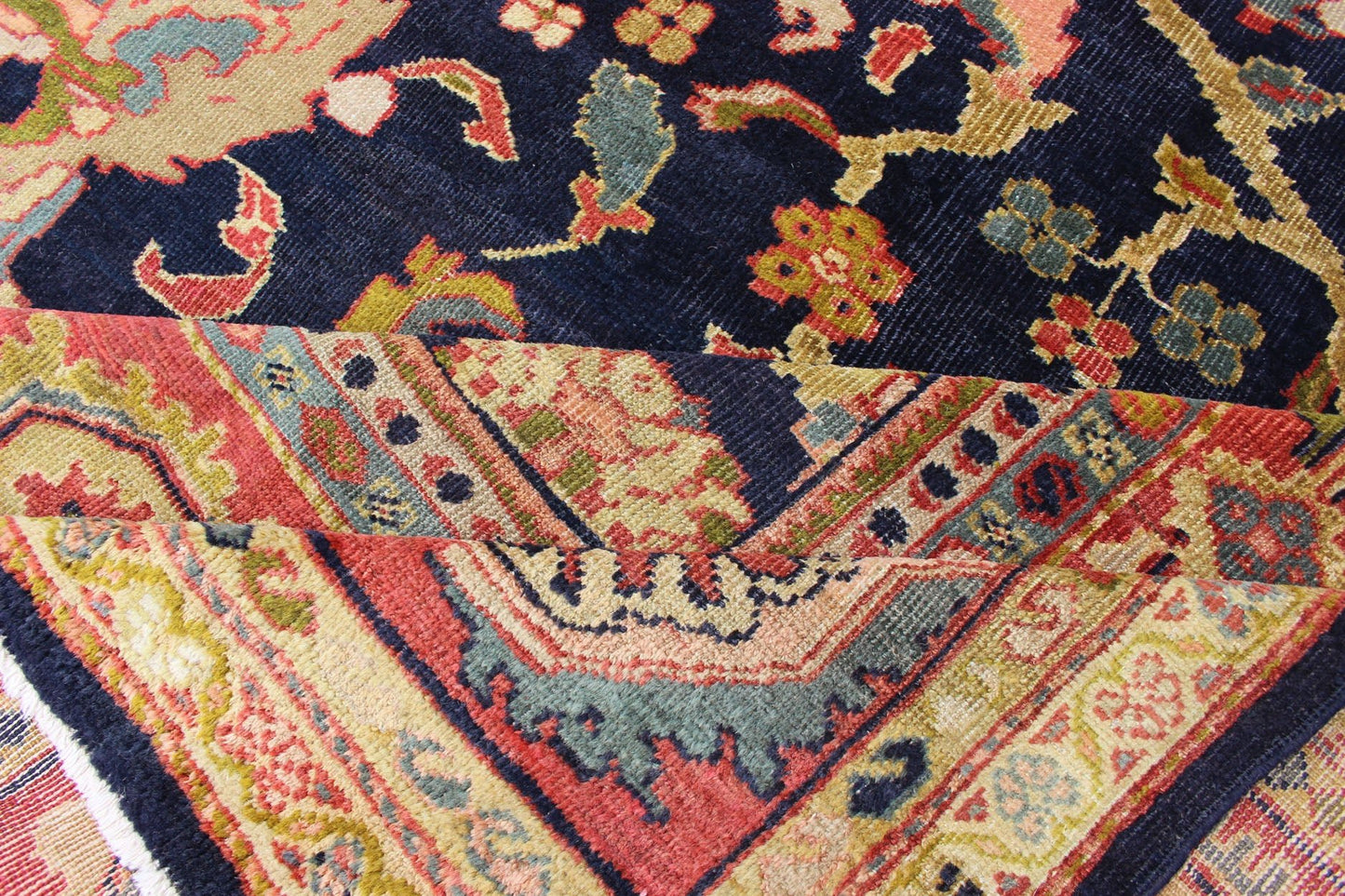 Amazing antique Persian Sultanabad carpet in navy blue background, yellow, citron green and rose red with large scale flowers. Keivan Woven Arts / 13 - 0511 / country of origin / type: Iran / Sultanabad, circa 1880. 19th century Sultanabad. Navy antique ... - Keivan Woven Arts13 - 0511 - 4226Rug