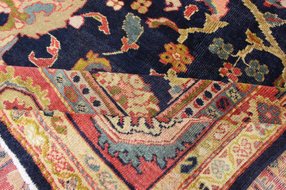 Amazing antique Persian Sultanabad carpet in navy blue background, yellow, citron green and rose red with large scale flowers. Keivan Woven Arts / 13 - 0511 / country of origin / type: Iran / Sultanabad, circa 1880. 19th century Sultanabad. Navy antique ... - Keivan Woven Arts13 - 0511 - 4226Rug