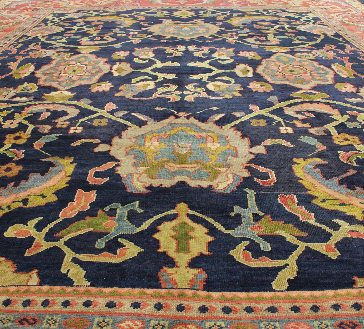 Amazing antique Persian Sultanabad carpet in navy blue background, yellow, citron green and rose red with large scale flowers. Keivan Woven Arts / 13 - 0511 / country of origin / type: Iran / Sultanabad, circa 1880. 19th century Sultanabad. Navy antique ... - Keivan Woven Arts13 - 0511 - 4226Rug