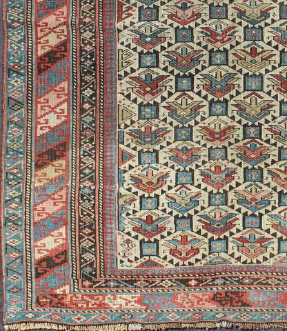 Antique Caucasian Fine Shirvan Rug in Ivory Background & Multi Colors. Country of Origin: Caucasus; Type: Shirvan; Design: All - Over, Geometric, Crest; Keivan Woven Arts: rug 13 - 0802; Caucasian Rug, Shirvan Caucasian Measures: 3'10 x 4'10 This fin... - Keivan Woven Arts13 - 0802 - 4772Rug