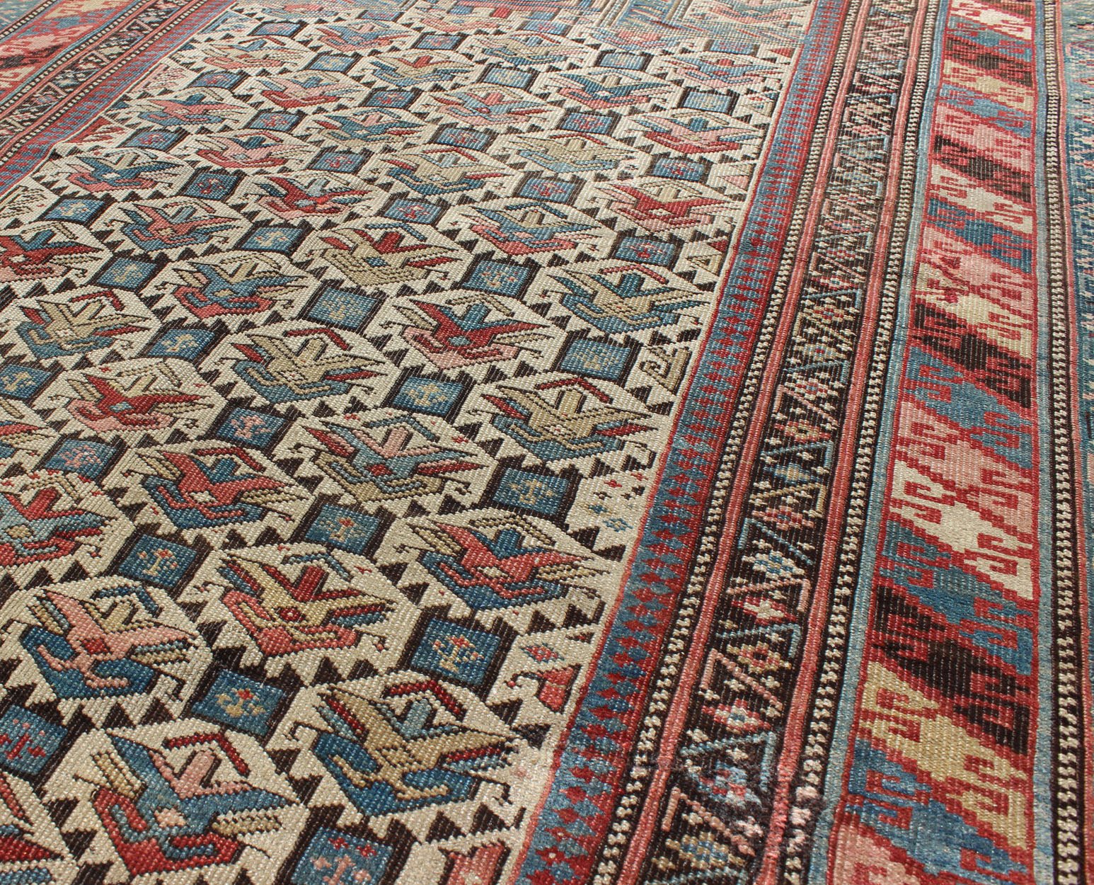 Antique Caucasian Fine Shirvan Rug in Ivory Background & Multi Colors. Country of Origin: Caucasus; Type: Shirvan; Design: All - Over, Geometric, Crest; Keivan Woven Arts: rug 13 - 0802; Caucasian Rug, Shirvan Caucasian Measures: 3'10 x 4'10 This fin... - Keivan Woven Arts13 - 0802 - 4772Rug