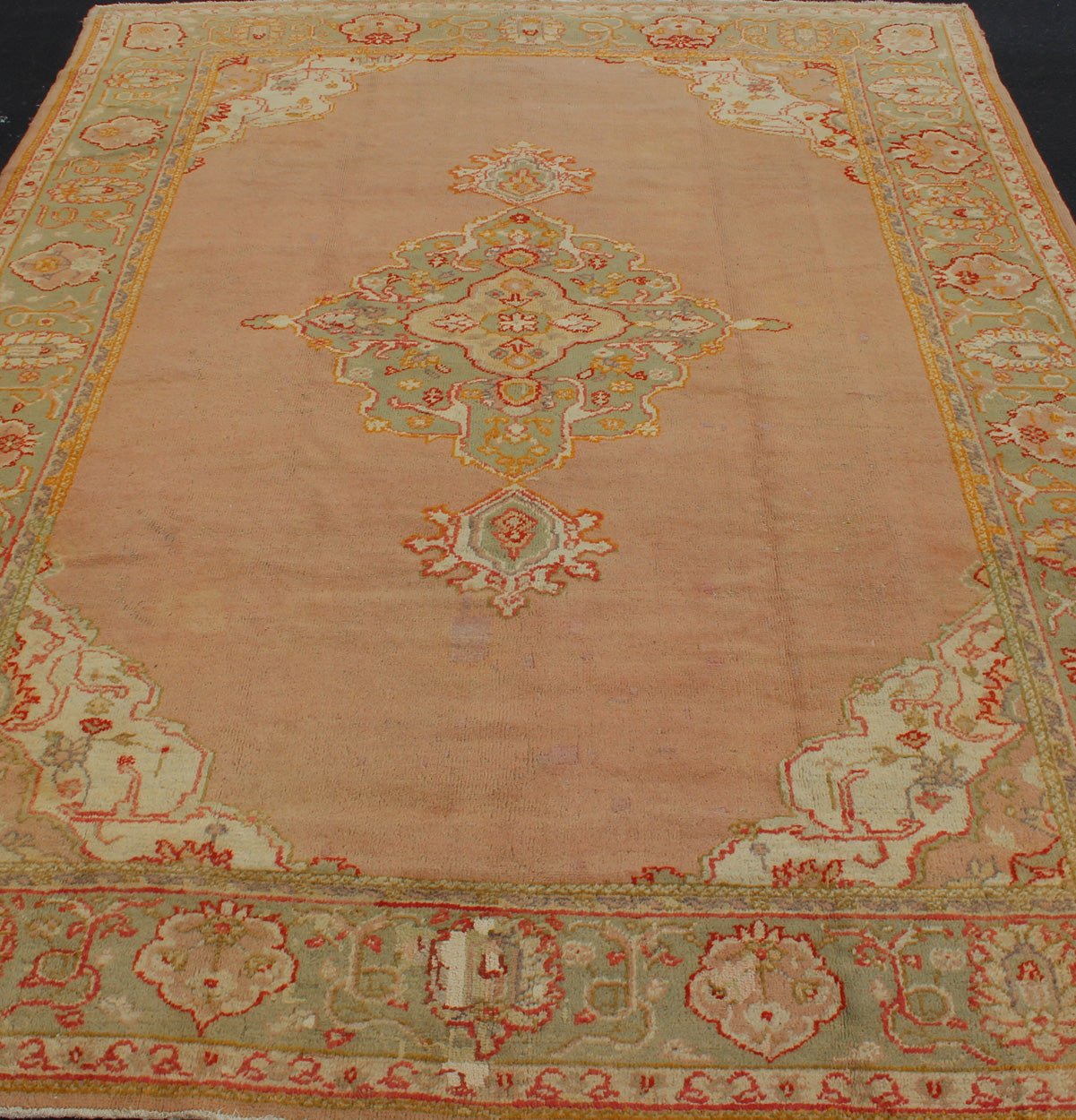 Keivan Woven Arts, kwarugs / 13 - 1004 Antique Turkish Oushak in Pink and Light Green Antique Turkish Oushak This antique Oushak from the early part of 20th Century bears a stylized medallion that commands the center field. Coral and light pink in... - Keivan Woven Arts13 - 1004 - 5154Rug