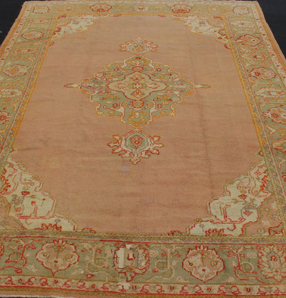 Keivan Woven Arts, kwarugs / 13 - 1004 Antique Turkish Oushak in Pink and Light Green Antique Turkish Oushak This antique Oushak from the early part of 20th Century bears a stylized medallion that commands the center field. Coral and light pink in... - Keivan Woven Arts13 - 1004 - 5154Rug