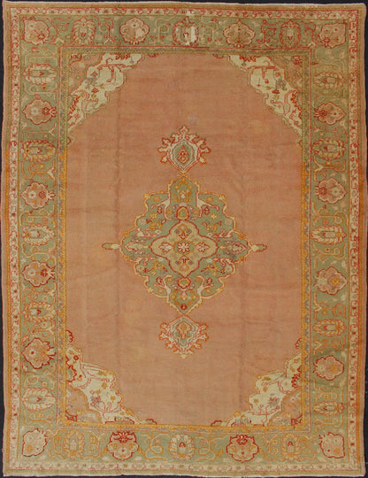 Keivan Woven Arts, kwarugs / 13 - 1004 Antique Turkish Oushak in Pink and Light Green Antique Turkish Oushak This antique Oushak from the early part of 20th Century bears a stylized medallion that commands the center field. Coral and light pink in... - Keivan Woven Arts13 - 1004 - 5154Rug