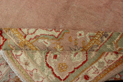 Keivan Woven Arts, kwarugs / 13 - 1004 Antique Turkish Oushak in Pink and Light Green Antique Turkish Oushak This antique Oushak from the early part of 20th Century bears a stylized medallion that commands the center field. Coral and light pink in... - Keivan Woven Arts13 - 1004 - 5154Rug