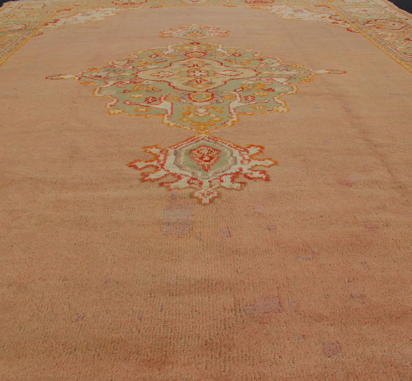 Keivan Woven Arts, kwarugs / 13 - 1004 Antique Turkish Oushak in Pink and Light Green Antique Turkish Oushak This antique Oushak from the early part of 20th Century bears a stylized medallion that commands the center field. Coral and light pink in... - Keivan Woven Arts13 - 1004 - 5154Rug