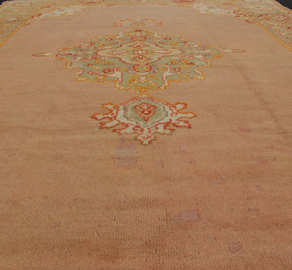Keivan Woven Arts, kwarugs / 13 - 1004 Antique Turkish Oushak in Pink and Light Green Antique Turkish Oushak This antique Oushak from the early part of 20th Century bears a stylized medallion that commands the center field. Coral and light pink in... - Keivan Woven Arts13 - 1004 - 5154Rug