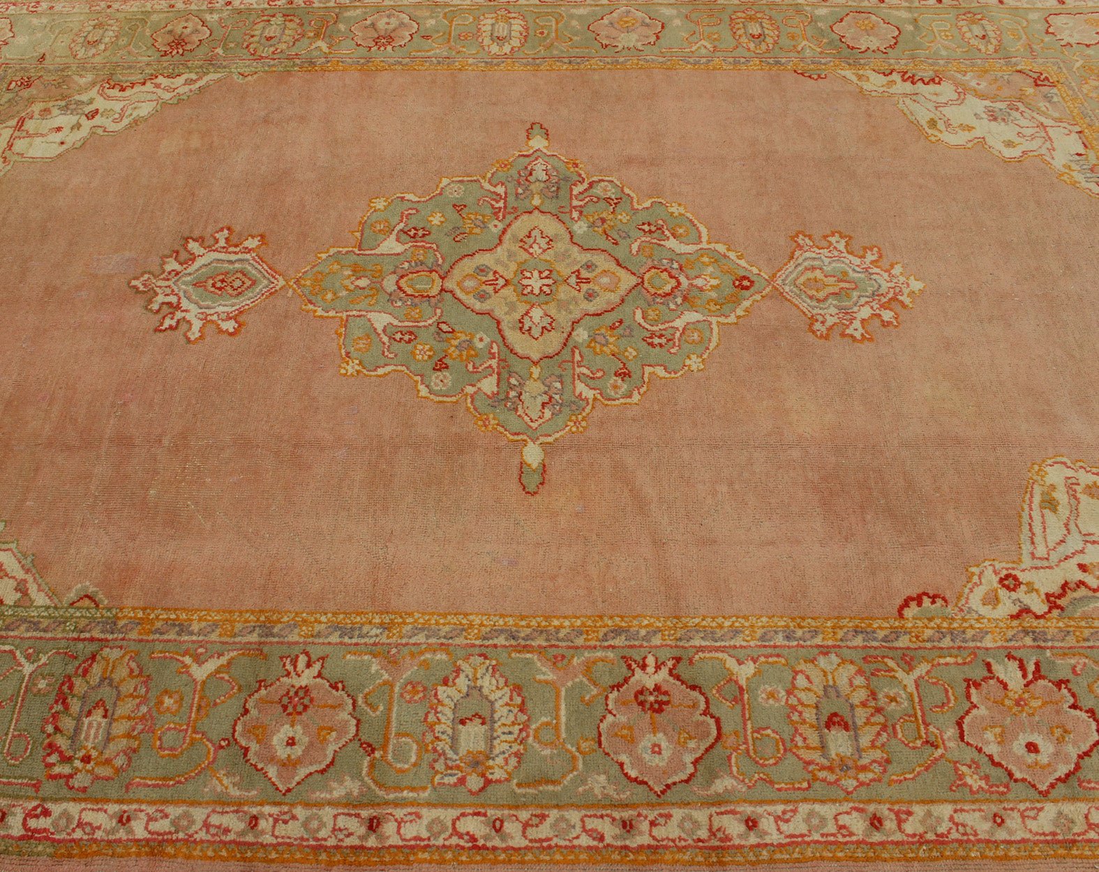 Keivan Woven Arts, kwarugs / 13 - 1004 Antique Turkish Oushak in Pink and Light Green Antique Turkish Oushak This antique Oushak from the early part of 20th Century bears a stylized medallion that commands the center field. Coral and light pink in... - Keivan Woven Arts13 - 1004 - 5154Rug